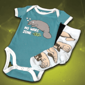 Image of a baby onsie and a sock with manatees on them.